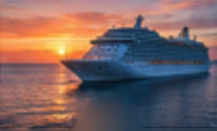 Cruise ship sailing at sunset