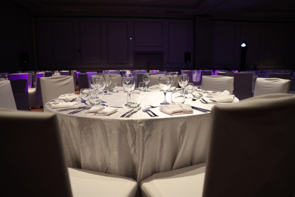 Incentive travel dinner set with white linen and candlelight
